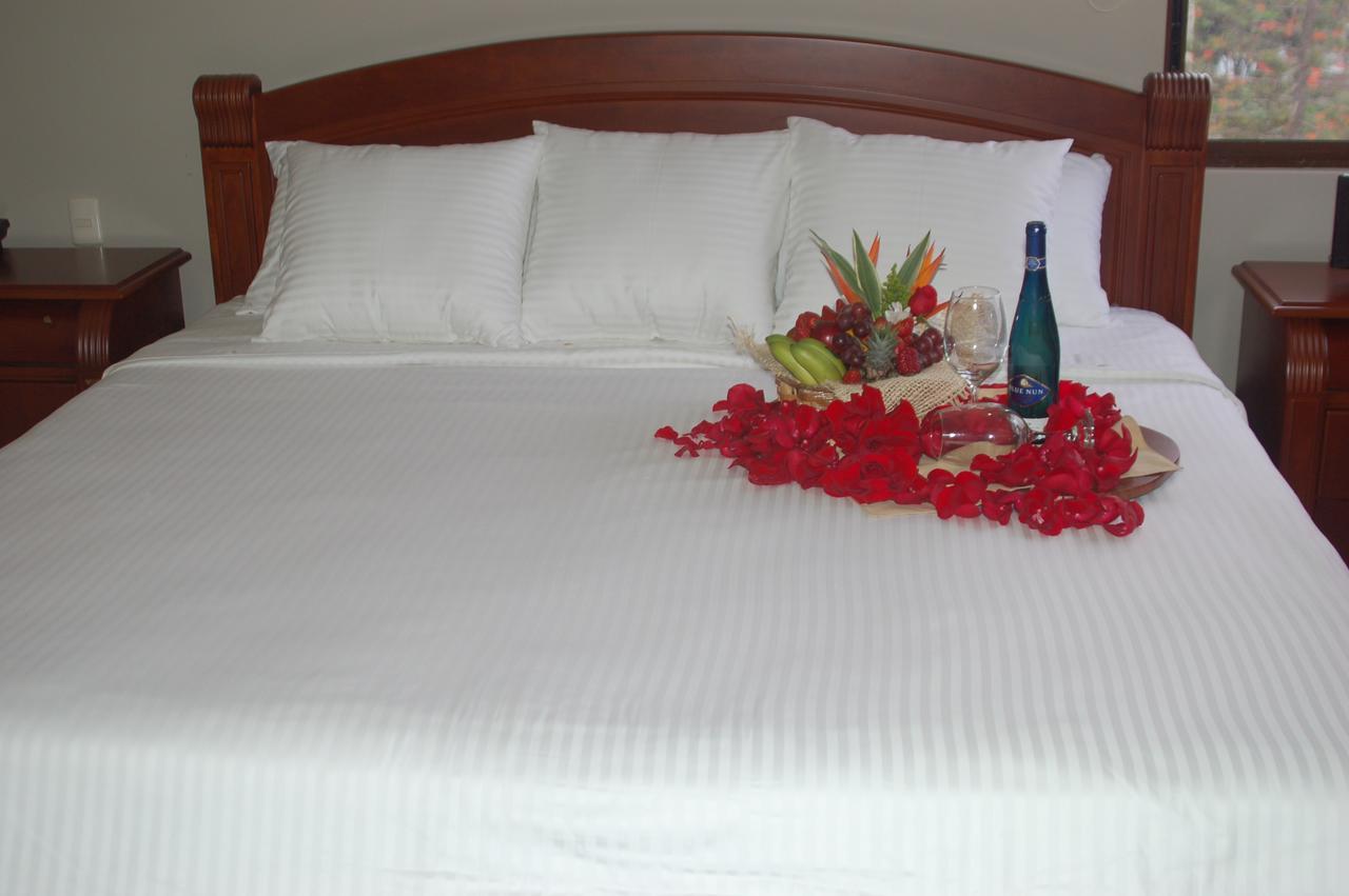 Hotel Maria Isabel Manta Habitación foto